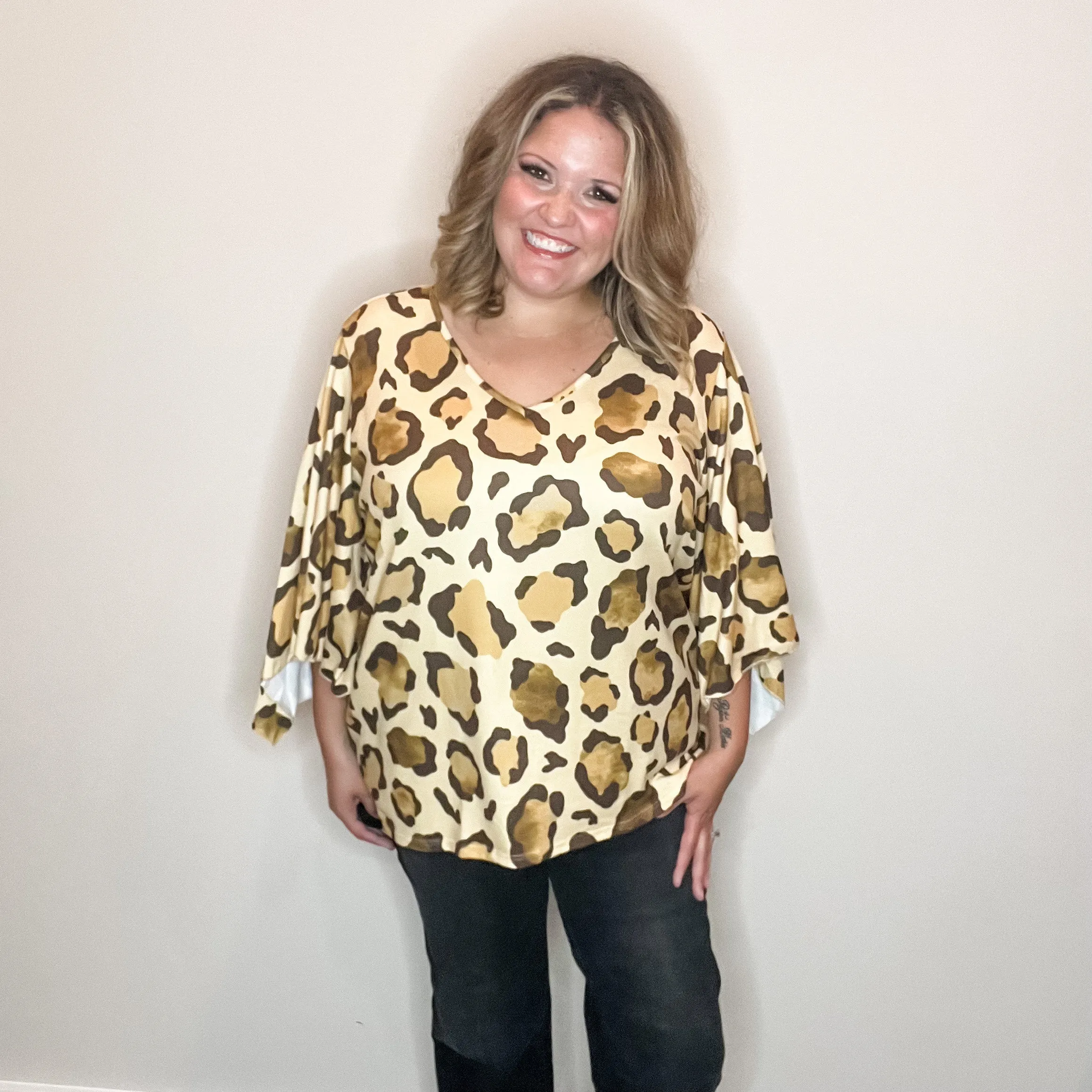 "Switch Up" Animal Print V Neck Tulip Sleeve